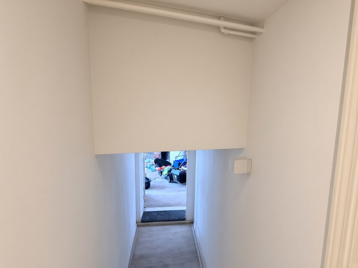 Corredor após a reparação da humidade